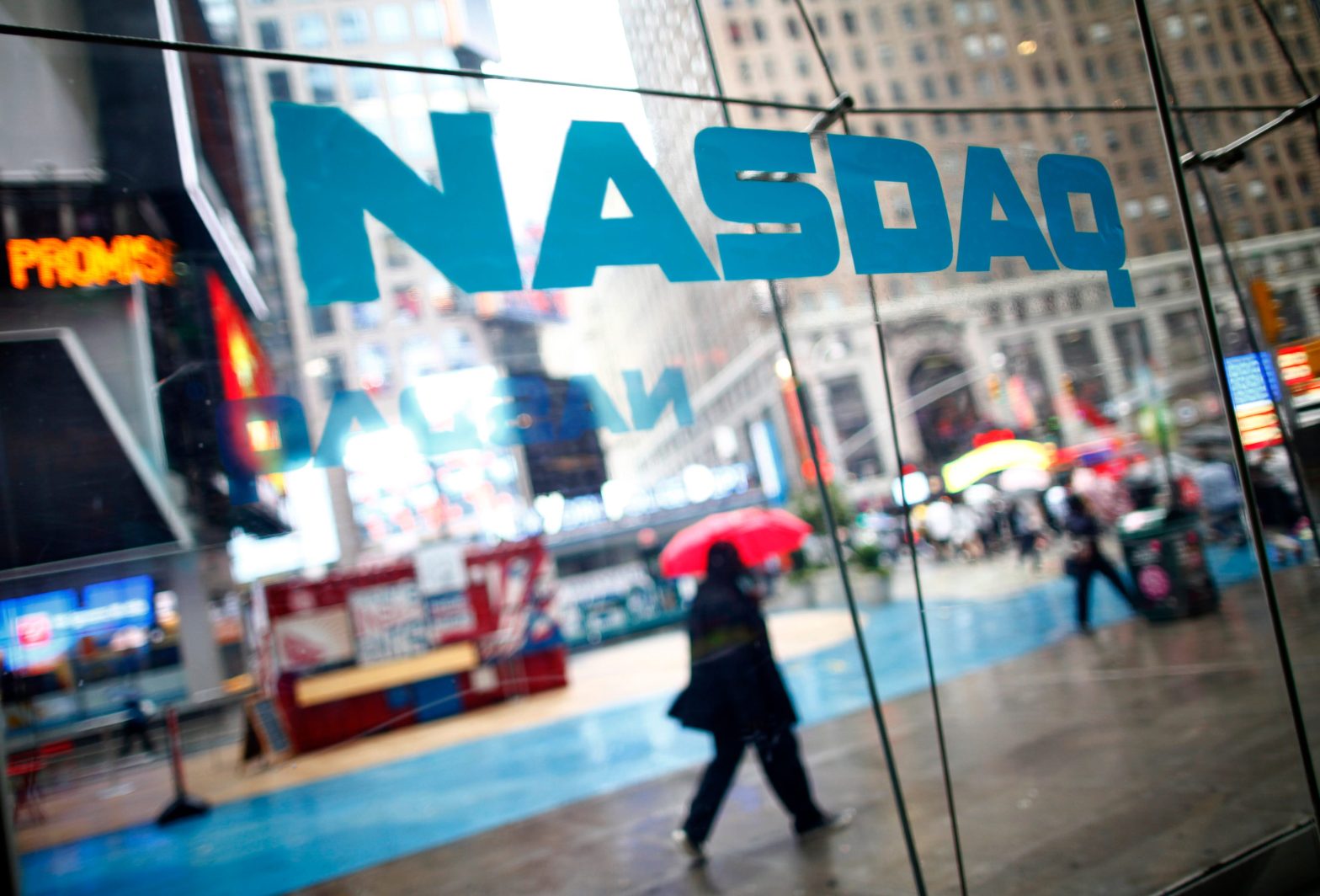 nasdaq-falls-after-alphabet’s-earnings-miss-ignites-worries-about-big-tech’s-digital-ad-sales