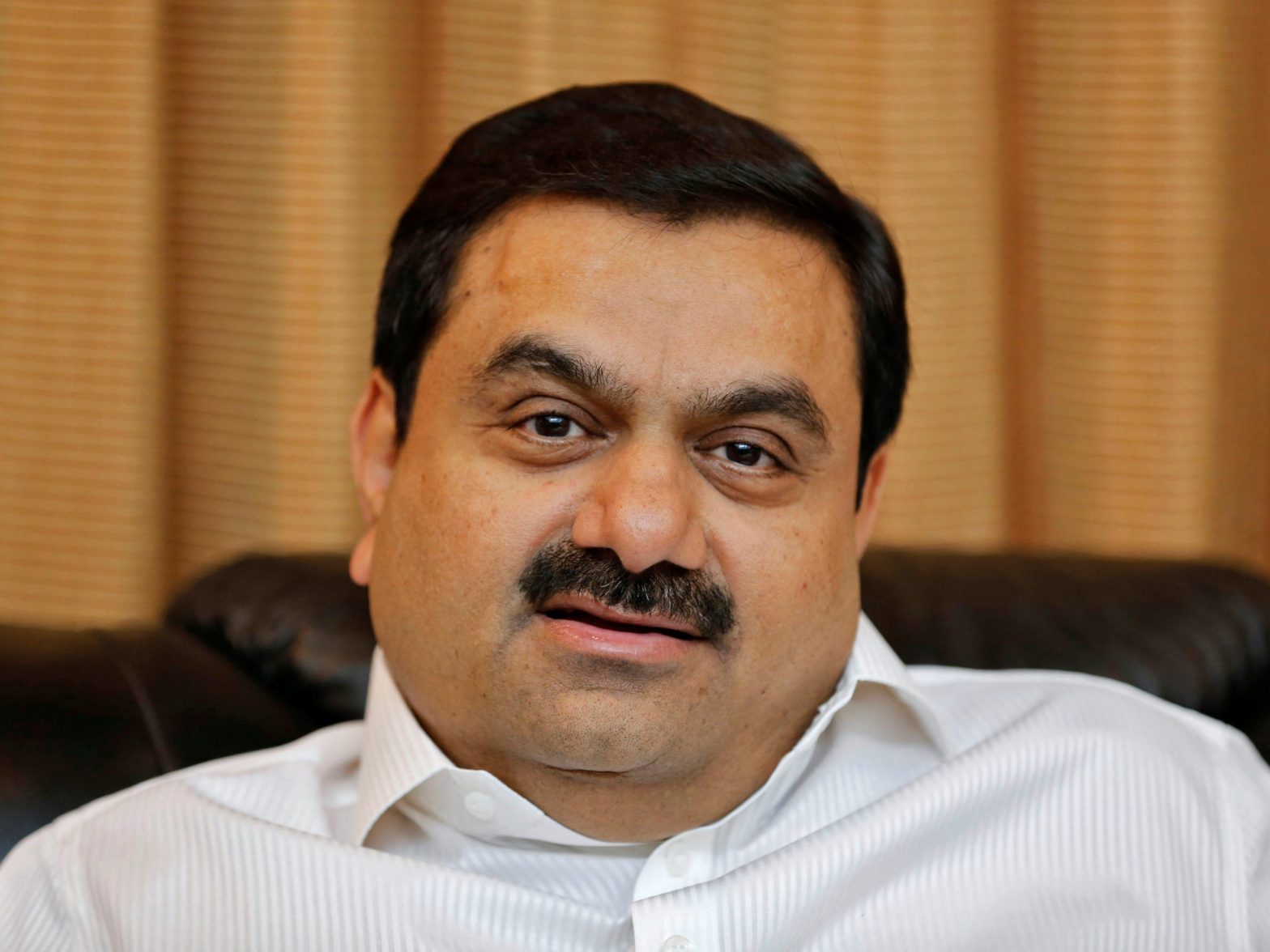 gautam-adani-—-the-world’s-richest-asian-—-saw-his-net-worth-crash-by-more-than-$5-billion-in-a-day-after-a-short-seller-targeted-his-business-empire